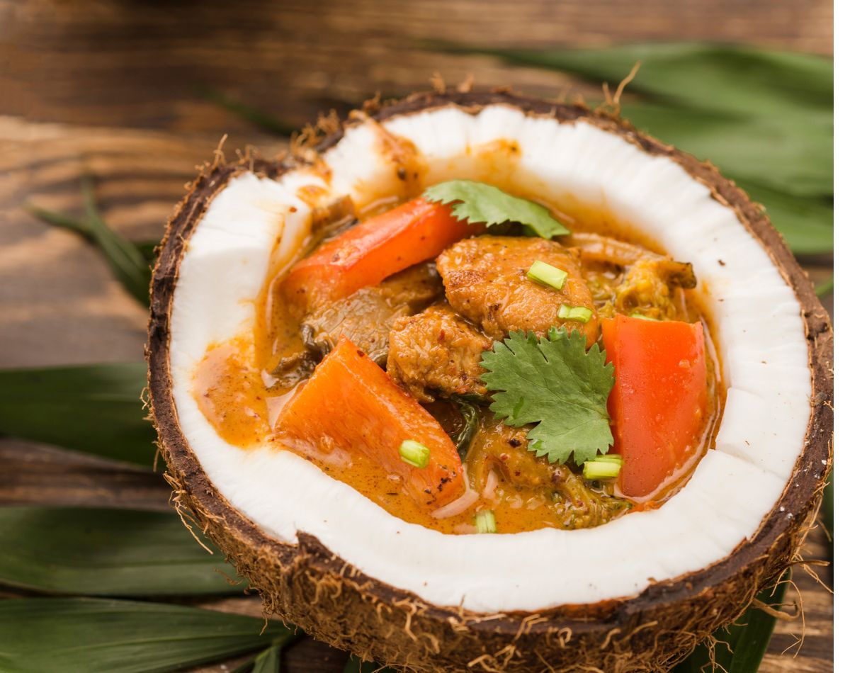 "A rich and aromatic coconut curry, infused with traditional spices, creamy coconut milk, and fresh herbs—an authentic homemade delight from Vijamma’s Recipes, perfect for pairing with rice or roti."
