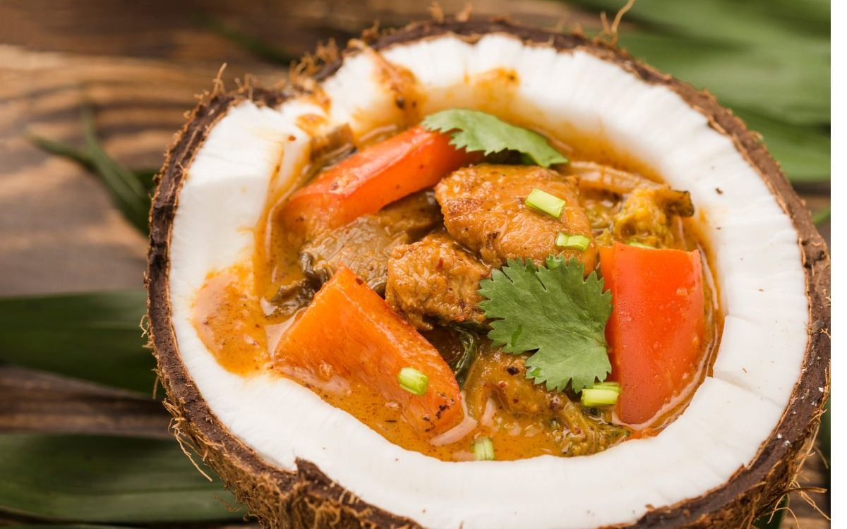 "A rich and aromatic coconut curry, infused with traditional spices, creamy coconut milk, and fresh herbs—an authentic homemade delight from Vijamma’s Recipes, perfect for pairing with rice or roti."